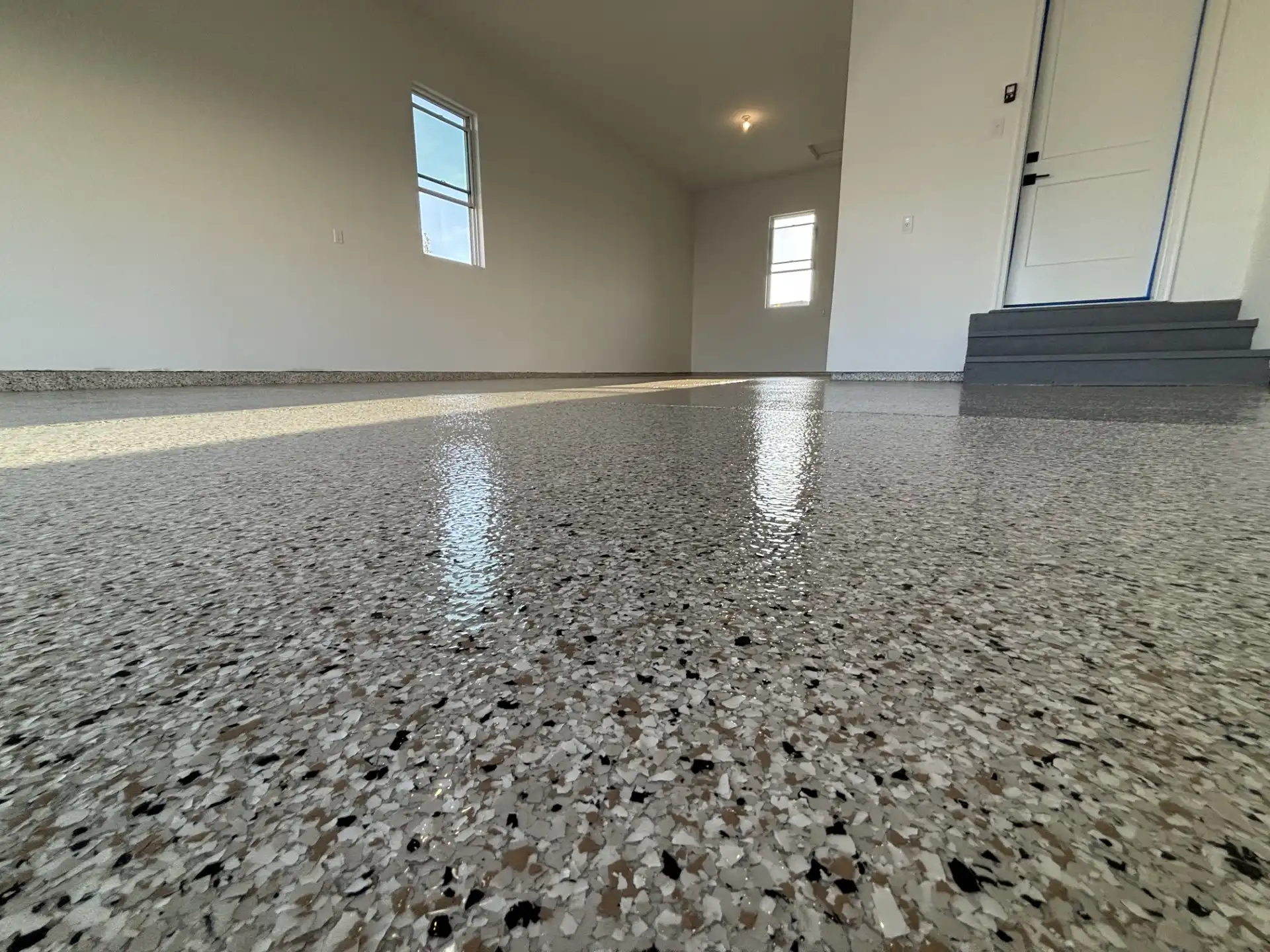 Light flake polyaspartic garage floor coating in Brownsburg and Avon, Indiana by Guy Coatings