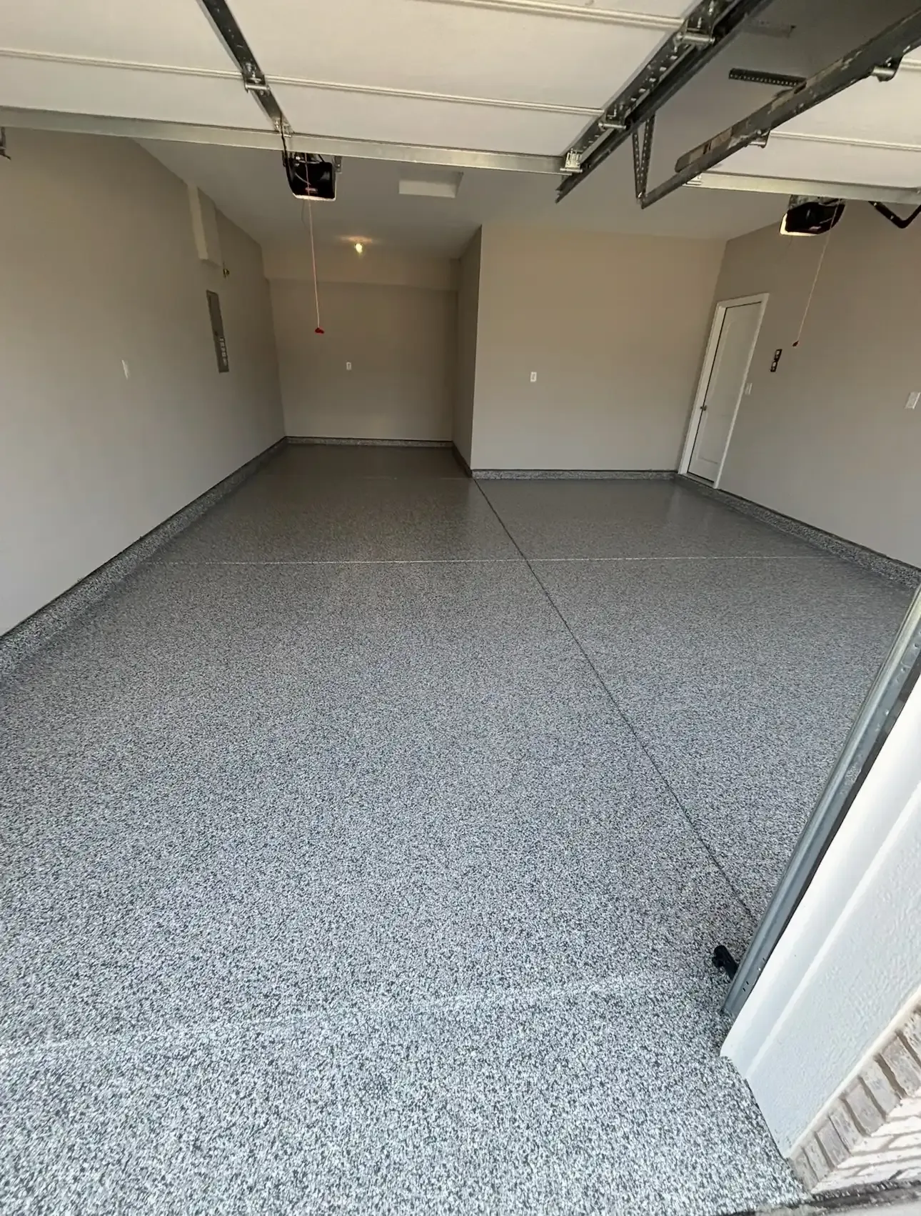 Polyaspartic flake garage floor coating in Carmel, Indiana by Guy Coatings