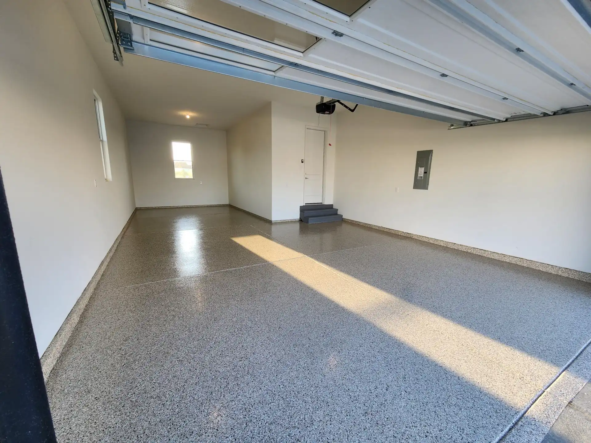 Polyaspartic garage floor coating with tan flake in Westfield, Indiana by Guy Coatings